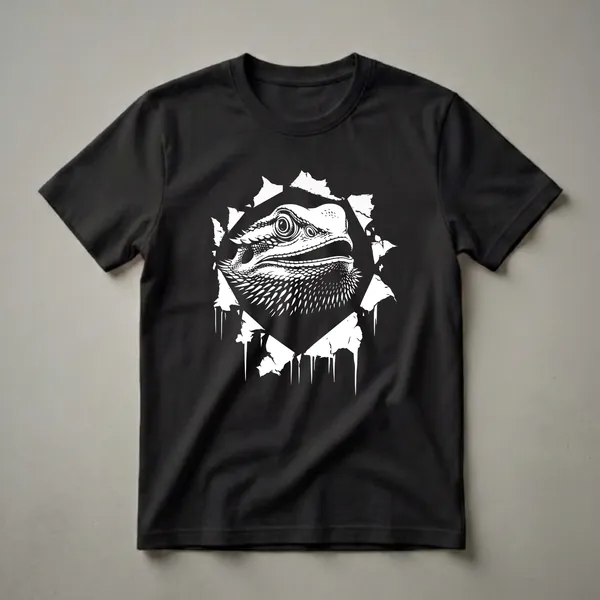 Black t-shirt featuring a white graphic of a bearded dragon's head peeking through a jagged, torn opening, with detailed scales and eyes.