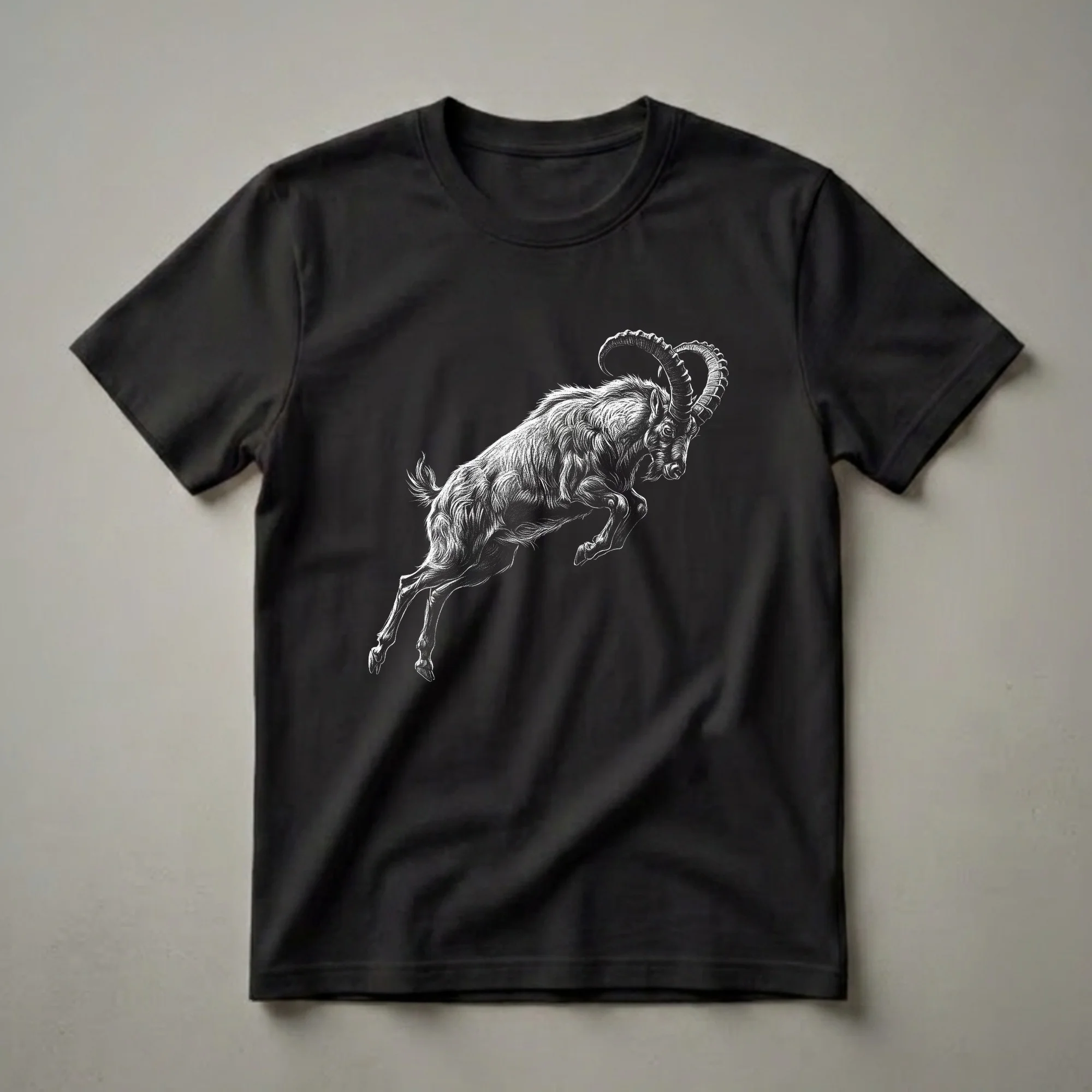 Black t-shirt with a white, detailed scratchboard illustration of an ibex goat leaping dynamically against a black background.
