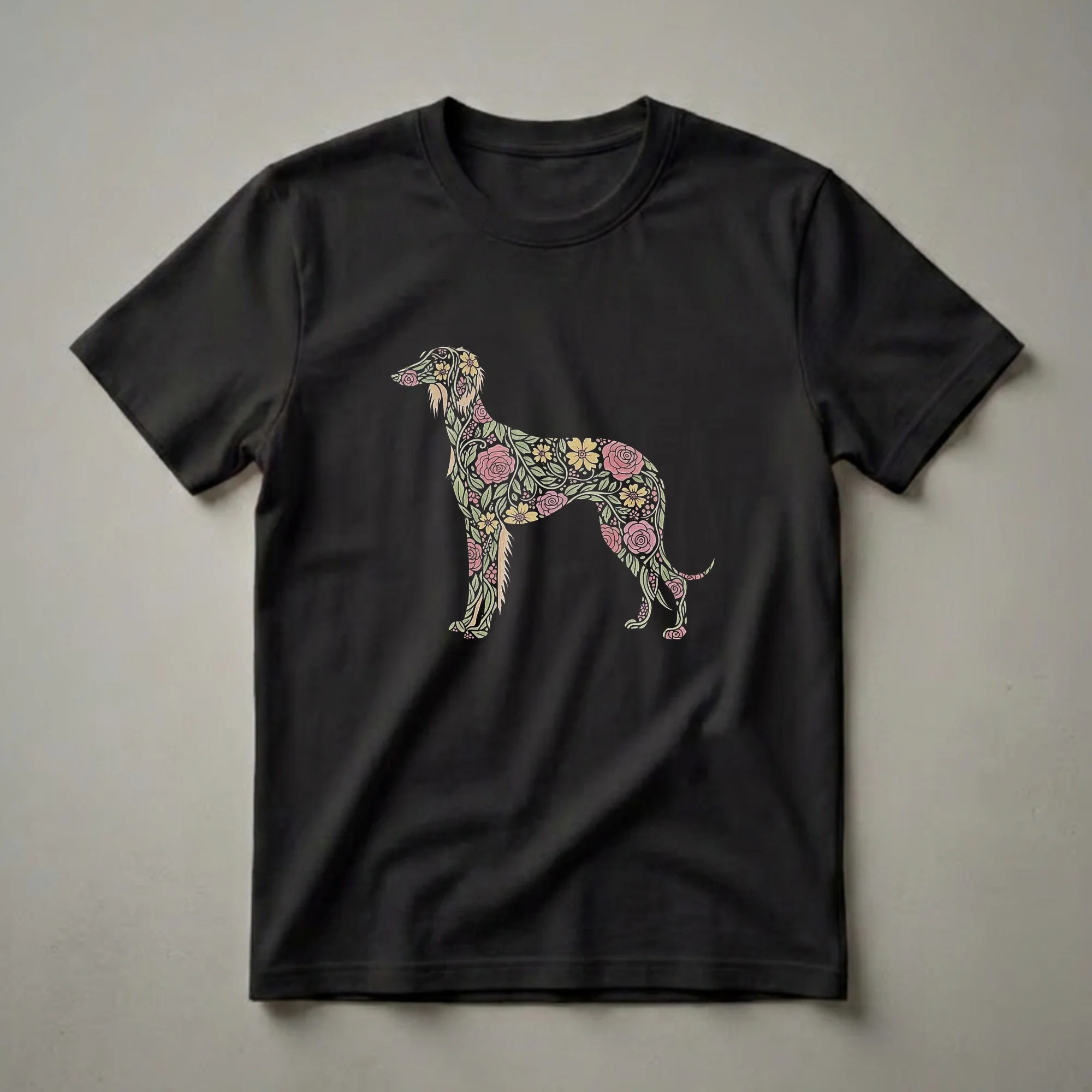 Black t-shirt featuring a Saluki dog silhouette filled with a colorful floral pattern of pink roses, yellow flowers, and green leaves.