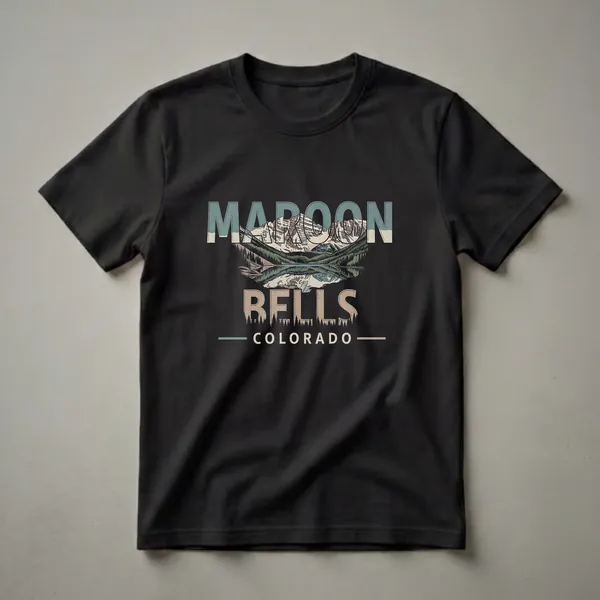 Black t-shirt with a retro graphic design of the Maroon Bells mountains reflected in a lake, with text reading 'MAROON BELLS COLORADO'.