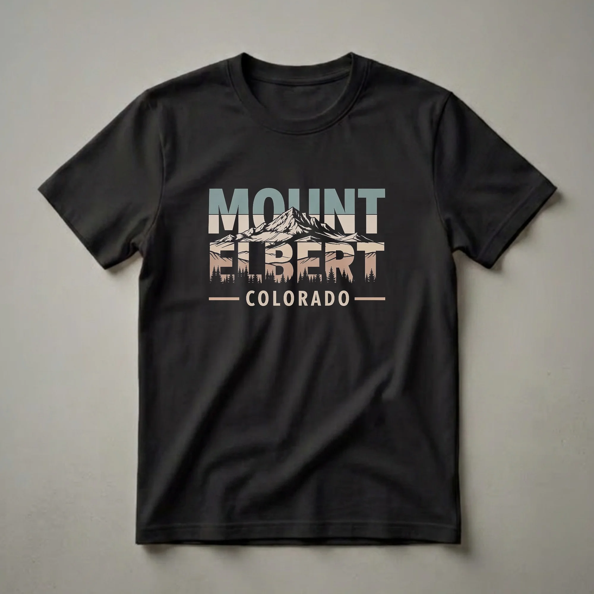 Black t-shirt with a retro graphic design of Mount Elbert, Colorado, featuring the mountain peak, pine trees, and text in muted colors.