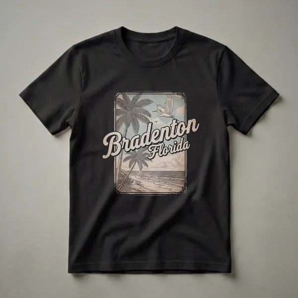 A retro graphic t-shirt featuring a vintage beach scene with palm trees, ocean waves, and a bird in flight, with the text 'Bradenton Florida'.