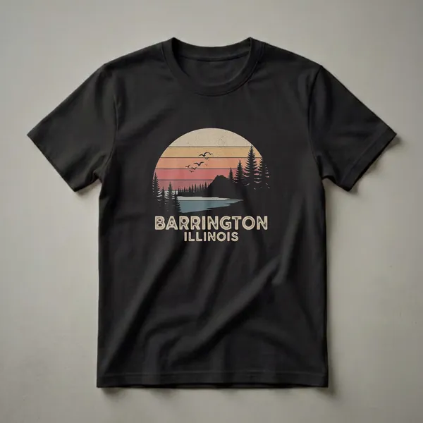 Black t-shirt with a retro sunset graphic depicting Barrington, Illinois, featuring a lake, pine trees, mountains, and birds.