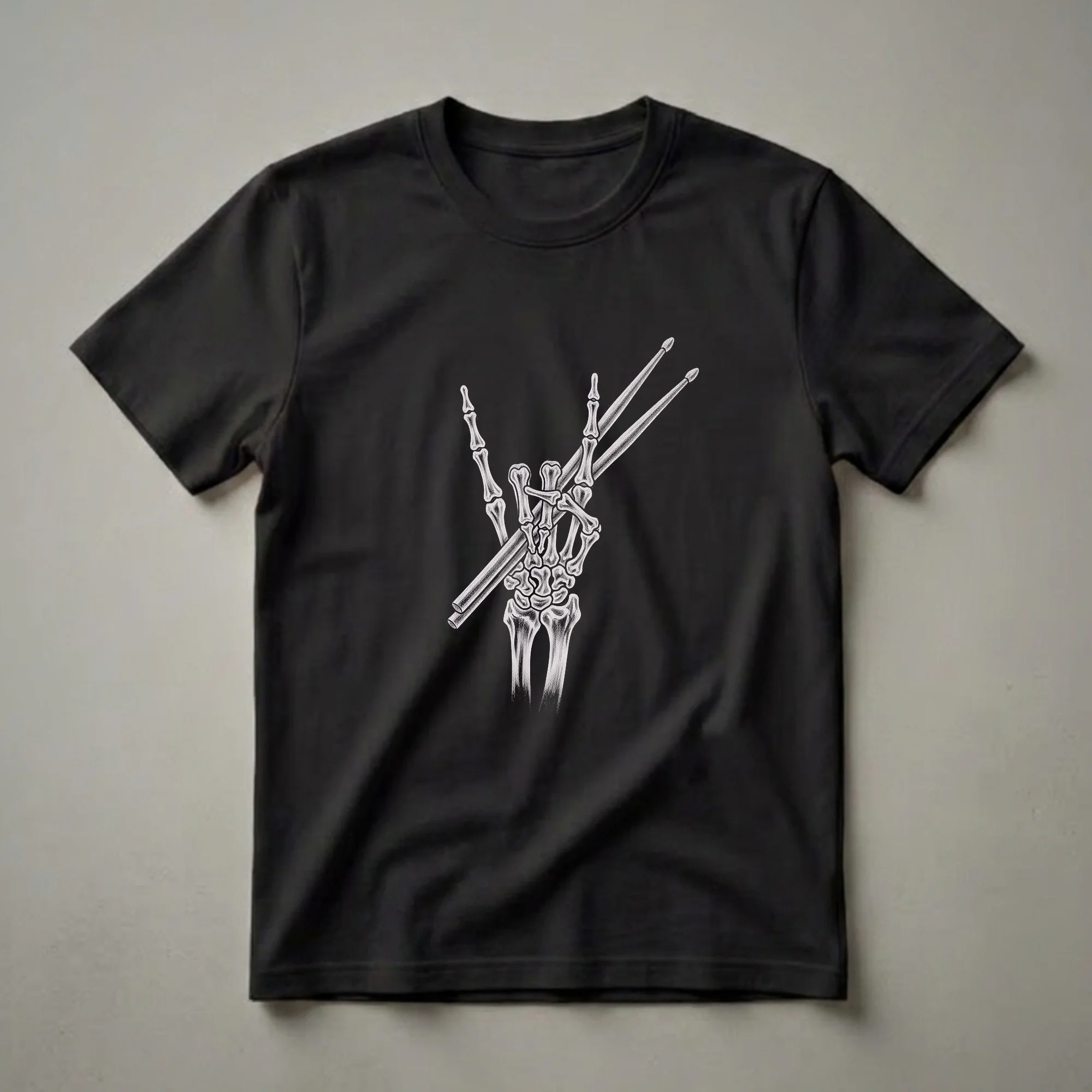 Black t-shirt with a white sketch art design of a skeleton hand making the rock-on gesture and holding two drumsticks.