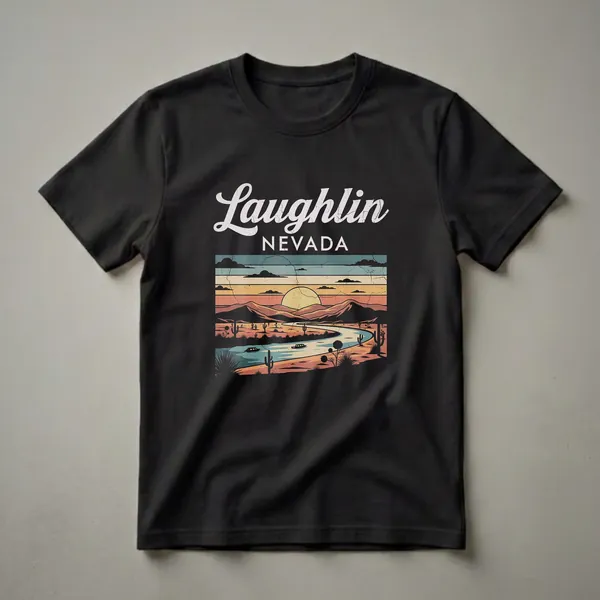 Black t-shirt with a retro graphic design of Laughlin, Nevada, featuring a desert sunset over mountains and a winding river with cacti and a boat.